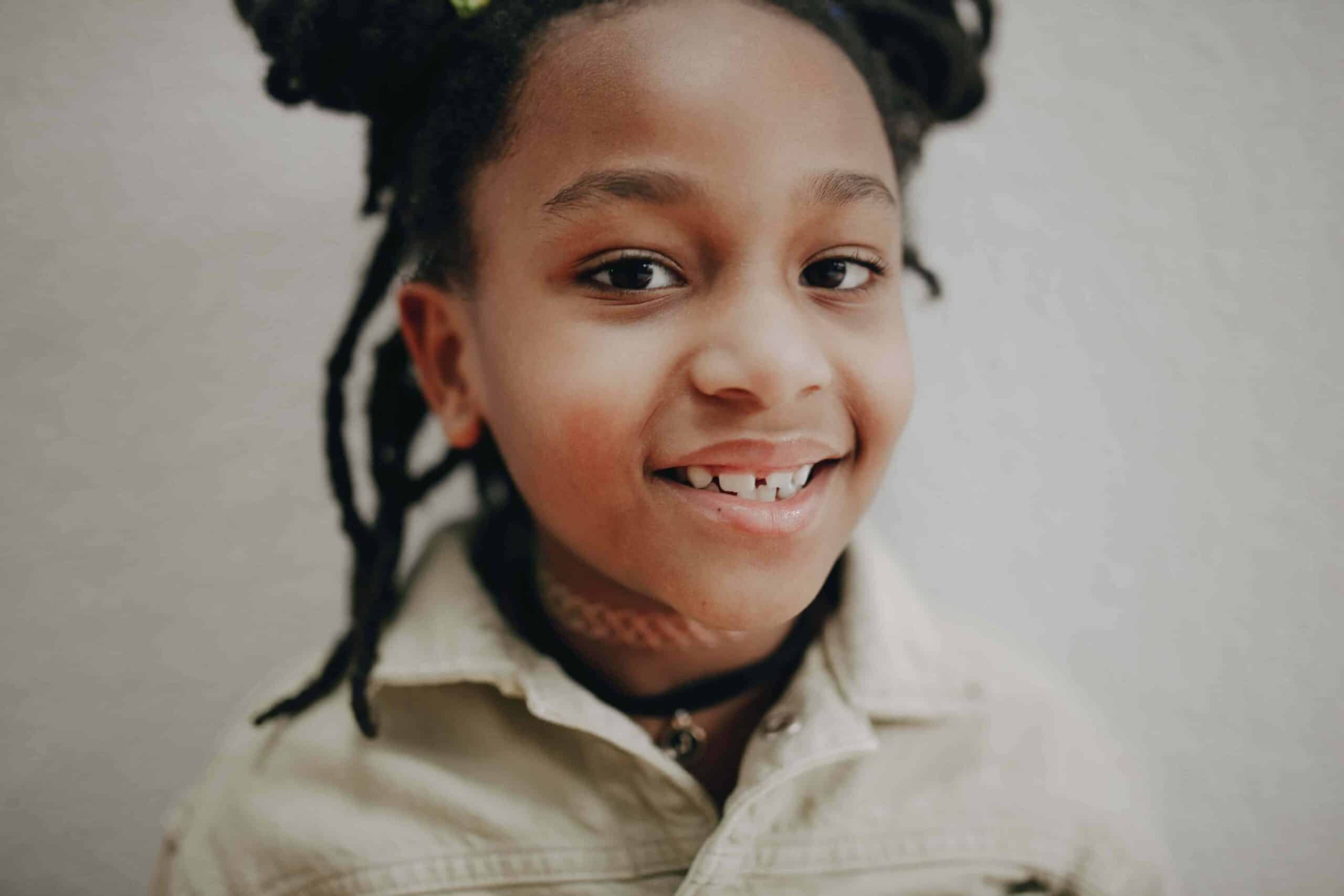 little girl with big gap in teeth